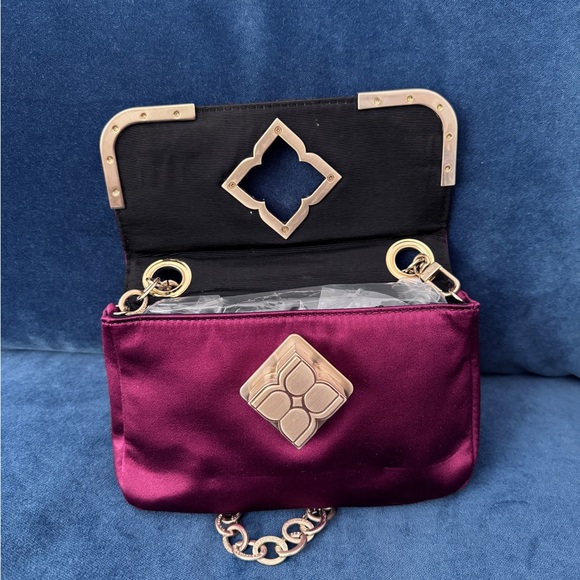 BCBGMaxAzria Burgundy Nylon/Satin
Clutch‎ With Gold Hardware
